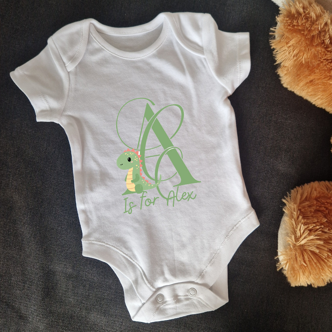 Personalised baby vest baby dinosaur